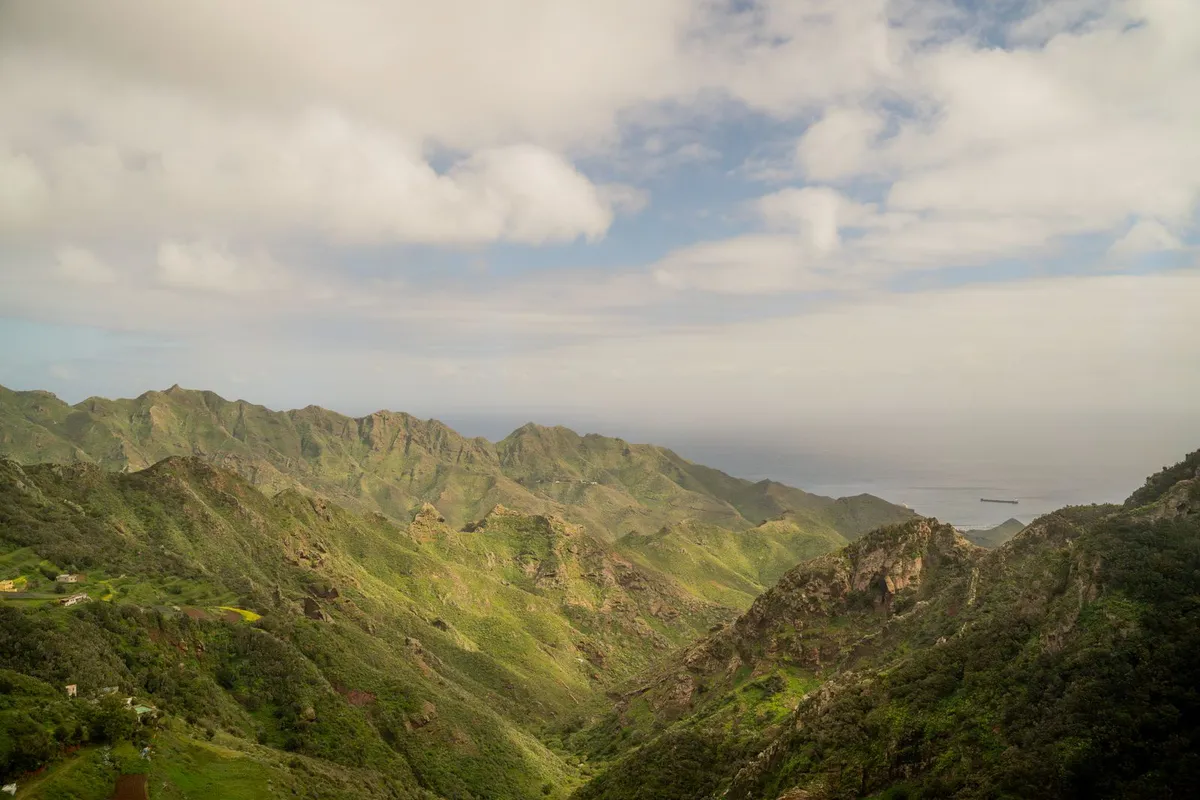 Green ridges of the Anaga mountains rolling down to the Atlantic under low trade-wind cloud